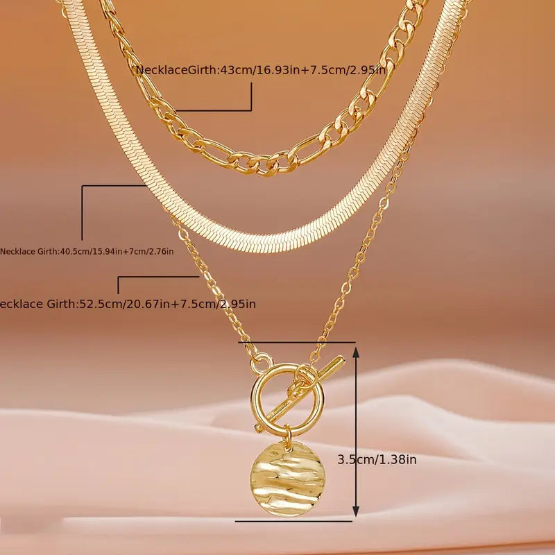 Gold Layered Necklace with Textured Coin Design by Savira