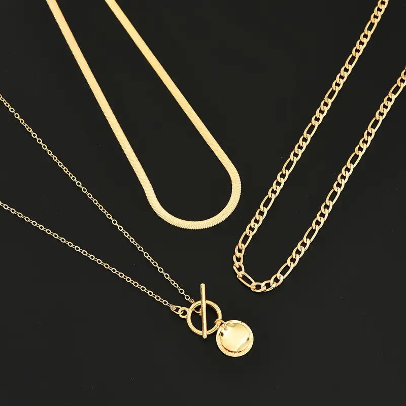 Gold Layered Necklace with Textured Coin Design by Savira