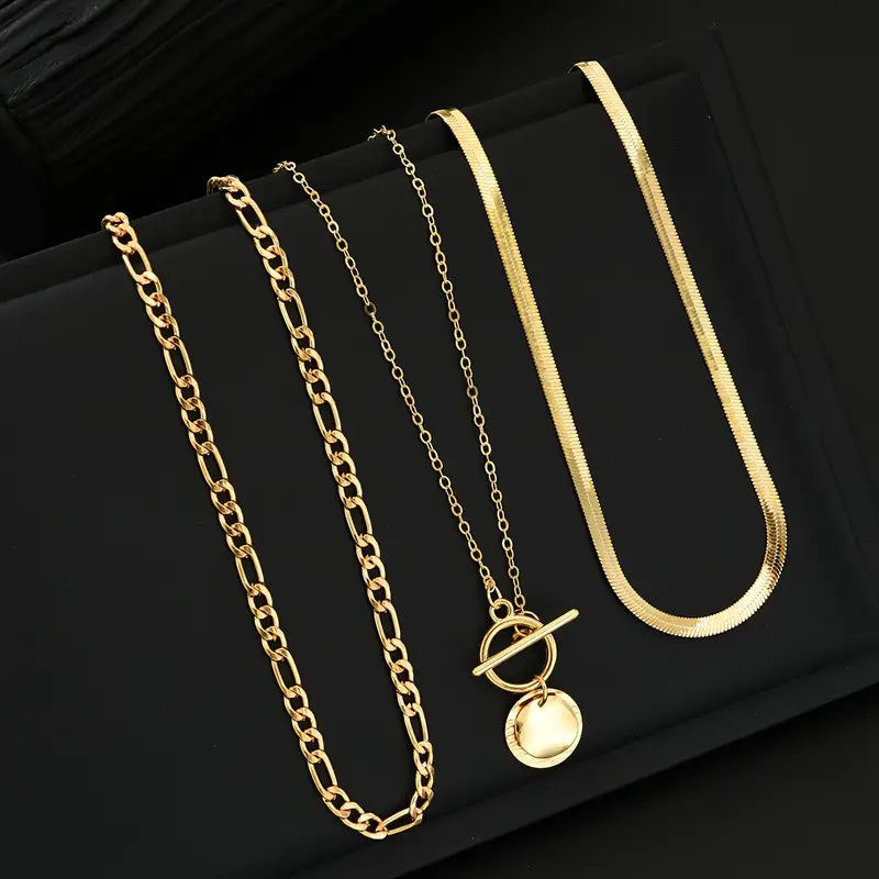 Gold Layered Necklace with Textured Coin Design by Savira