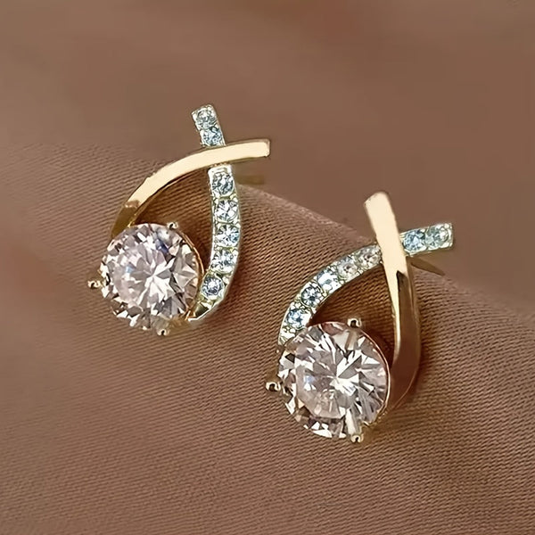 O&O - Golden Cross Zirconia Stud Earrings" can be rewritten as "O&O - Zirconia Stud Earrings with Golden Cross Design.