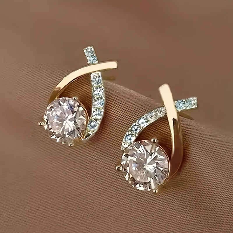 O&O - Golden Cross Zirconia Stud Earrings" can be rewritten as "O&O - Zirconia Stud Earrings with Golden Cross Design.