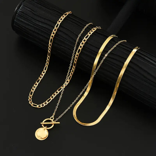 Gold Layered Necklace with Textured Coin Design by Savira
